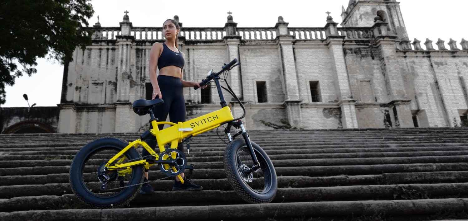 svitch electric bike stand with girl